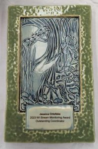 A close up of the new ceramic award plaque that is given to the winners