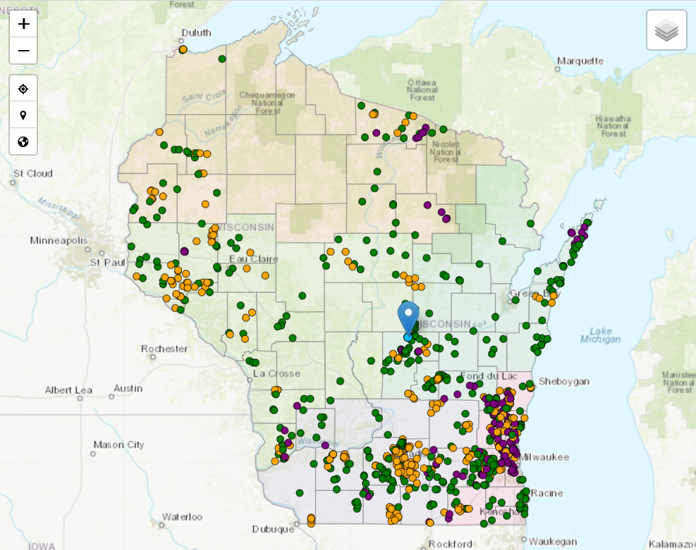 A map of Wisconsin with dots indicating volunteer stream monitoring sites. The dots are green, orange, and purple. 